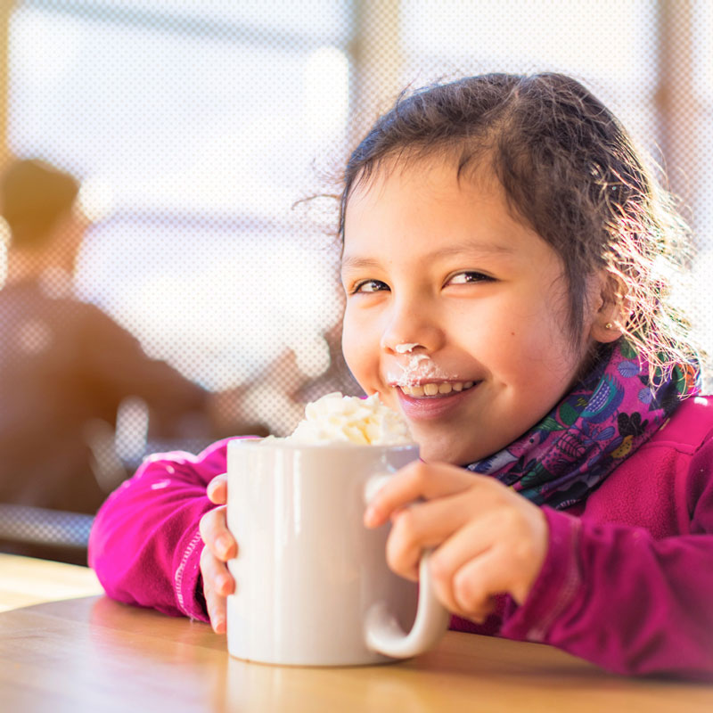 Snowboarder girl smiling